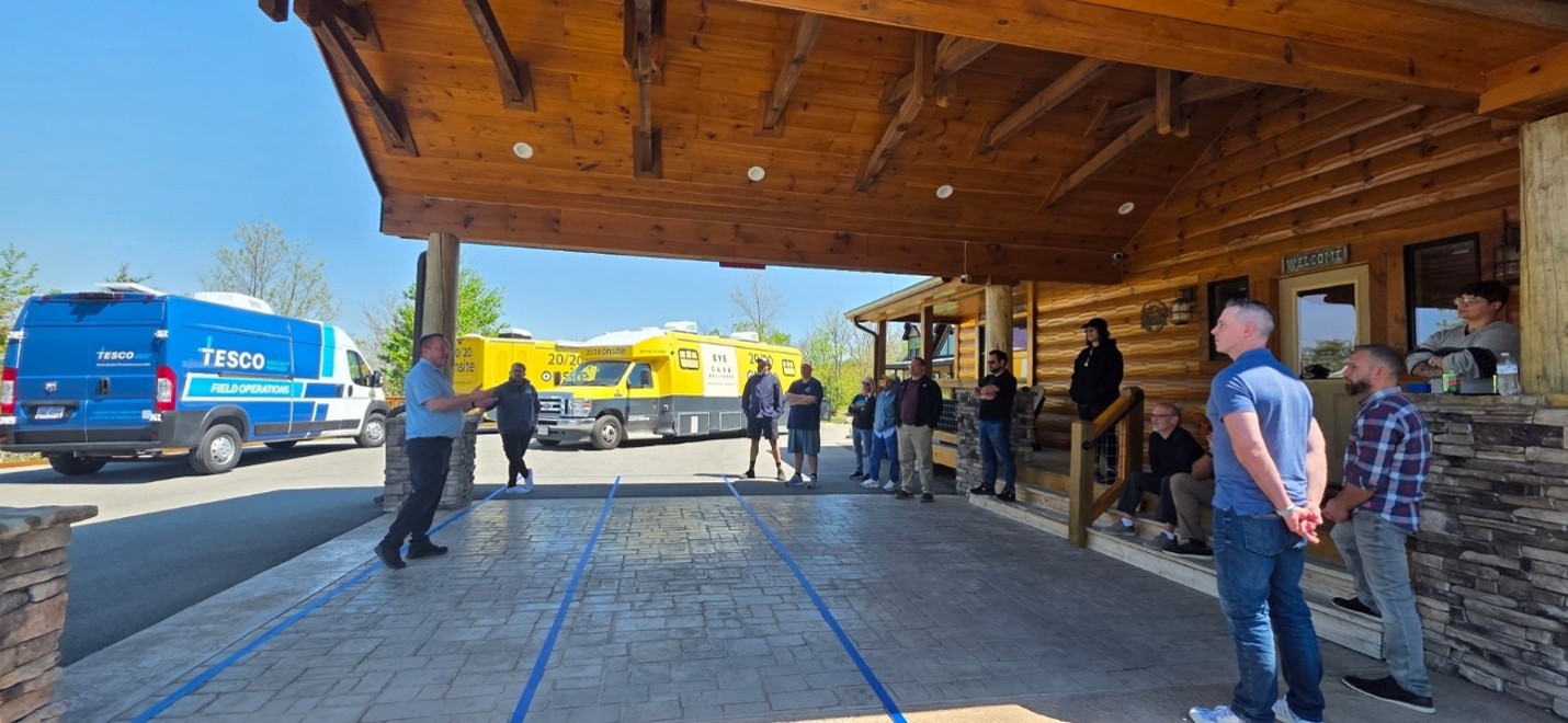 TESCO Specialty Vehicles Field Operations van alongside a 20/20 Onsite mobile vision clinic at a partner training event