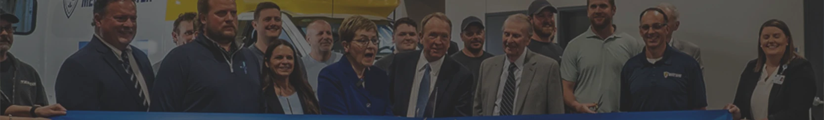 TESCO Specialty Vehicles staff and Congresswoman Marcy Kaptur at ribbon cutting ceremony for new mobile medical clinic facility