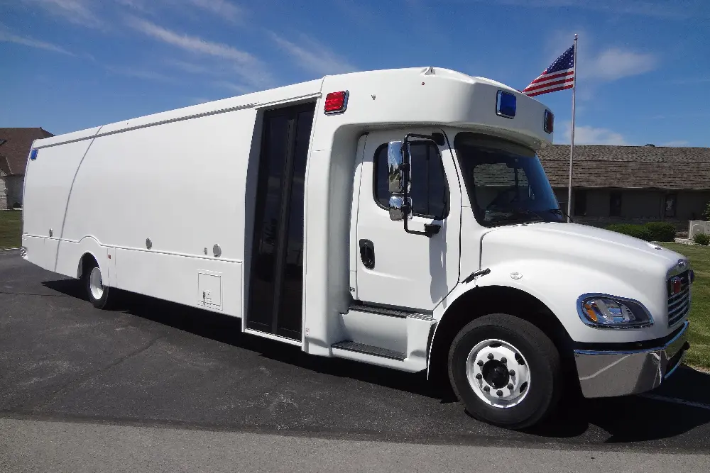 Prisoner transport bus with security features for law enforcement